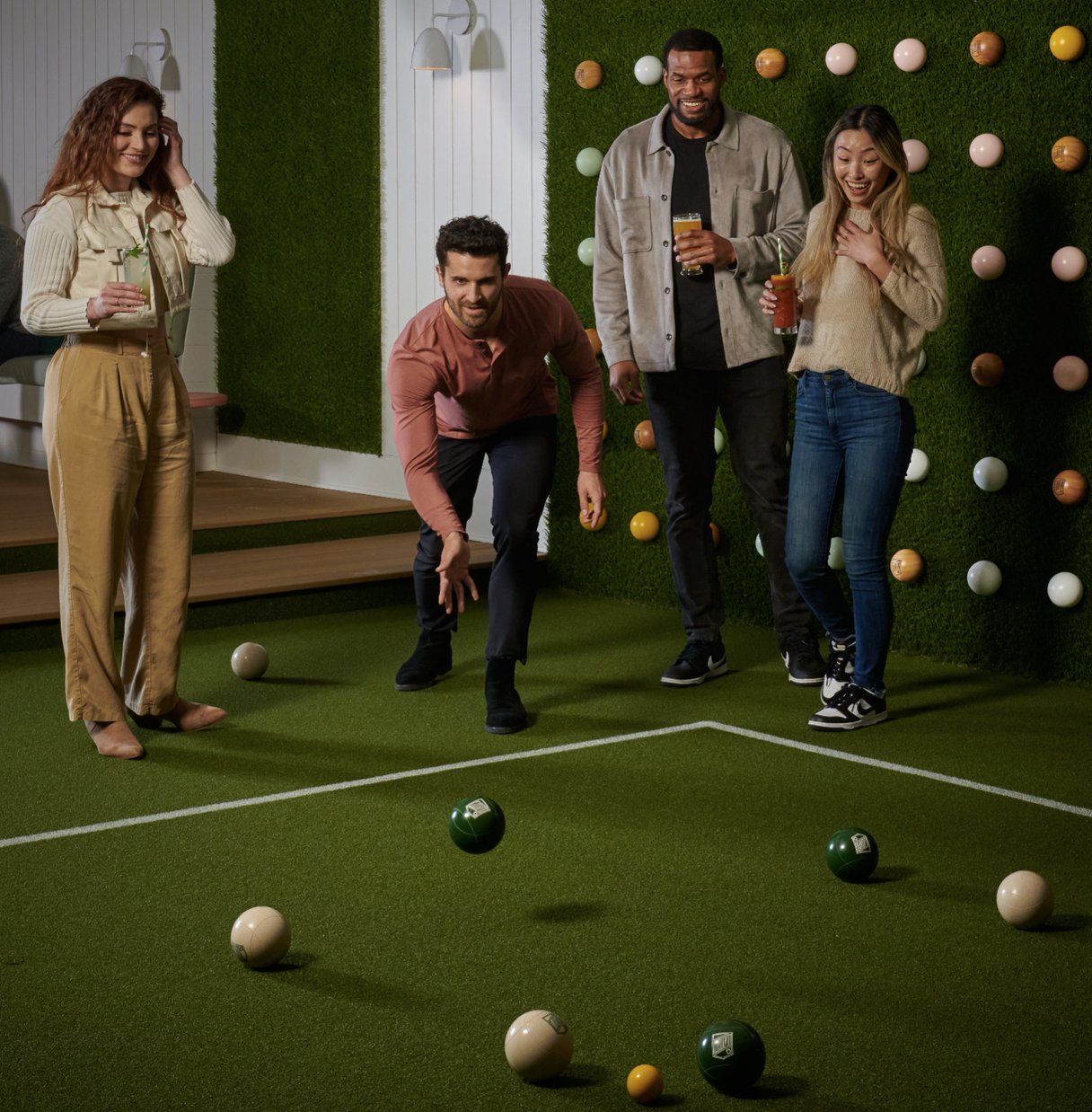 Group of friends playing lawn games